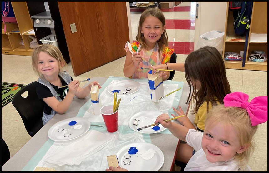 4 children painting