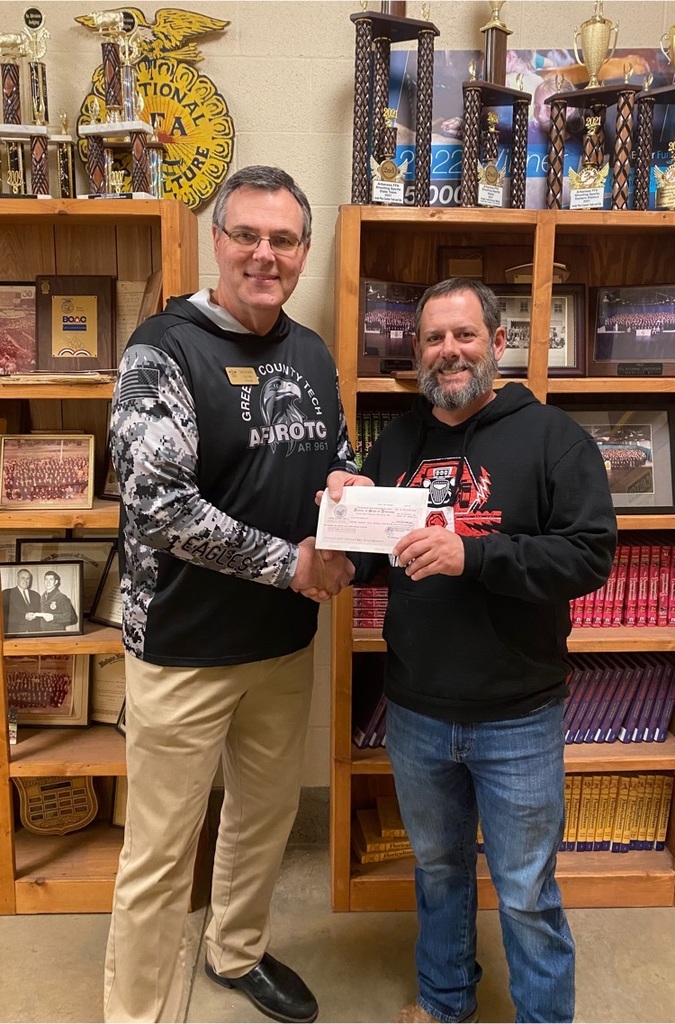 Mr Murray accepting a check