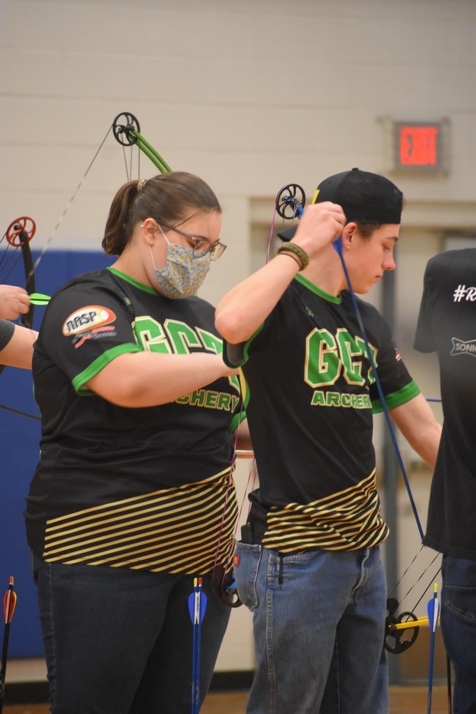 Archers getting ready to shoot